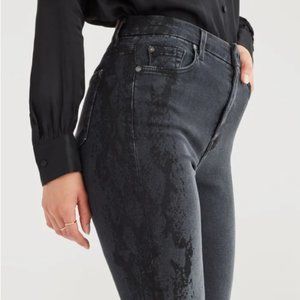 BARELY WORN Black Skinny Jeans Snake print detail